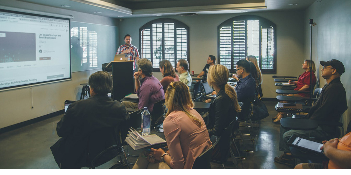 Teacher lecturing to students